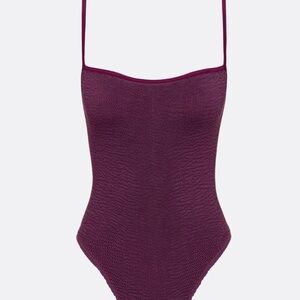 Never worn Plum color one piece swimsuit one size
